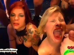 German redhead and brunette sluts enjoy a bukkake