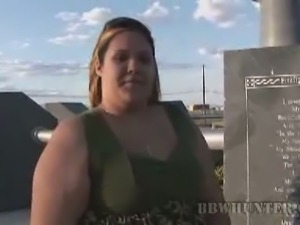 Plumper brunette takes a walk and provokes
