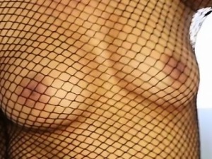 Bigbreasted chick in fishnet bodysuit gets her throat fucked