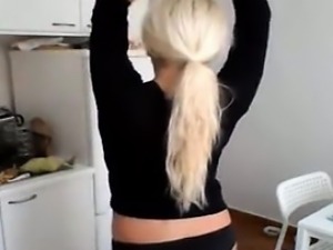Super sexy blonde milf strips in her kitchen on cam