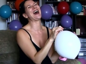 MILF sweetie Mina having fun blowing up balloons