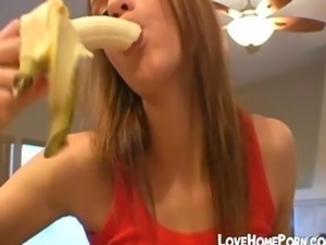 Cute Babe Eating A Banana