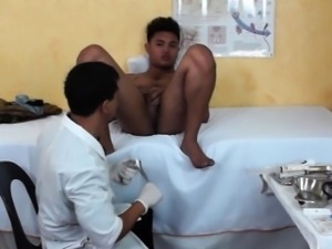 Asian MD spreads twink butt with speculum