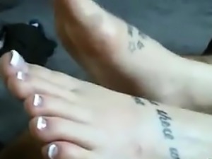 Tattooed Girlfriend Gives A Footjob POV
