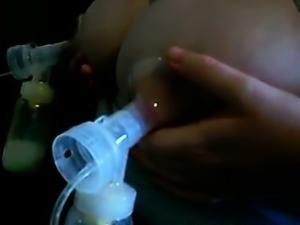 Mother Getting Milk From Her Big Tits