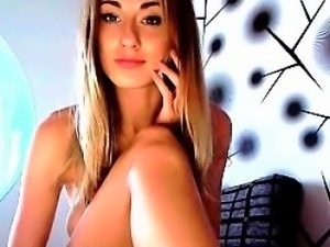 Hot busty brunette fingering pussy on webcam
