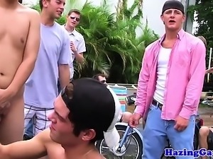 Outdoor student jerking at carwash initiation