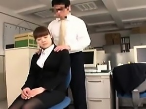 Luscious secretary with perky boobs kneels down and blows a