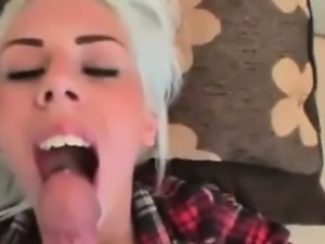 Slutty blonde worships a long shaft and swallows every drop