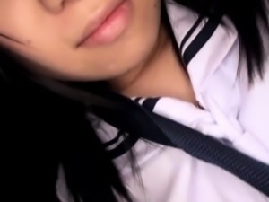 Tiny asian schoolgirl sucking cock in car