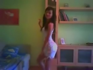 Svelte dark haired cam bitch in tight white dress was dancing on webcam