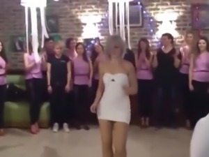 Woman in sexy short dress is dancing on family party