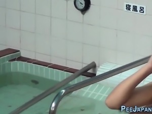 Bendy asian publicly pees