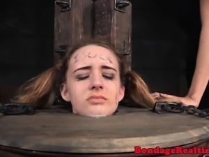 Submissive slut tormented in the barrel