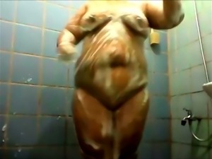 I watch incredibly nasty fattie taking shower and washing her body
