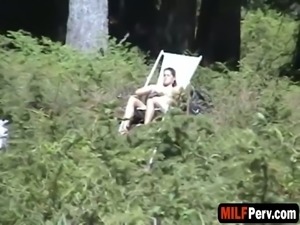 Dark haired milf gets banged outdoors in doggy