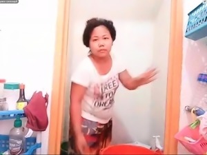 Mature asian milf takes shower