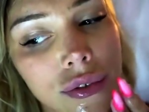 Gorgeous blonde teen films herself fingering her pussy