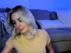 Blonde mature with big boobs masturbates in bed